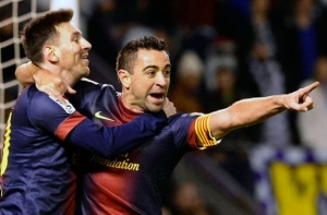 Xavi comemora gol e mais uma vitória com Messi